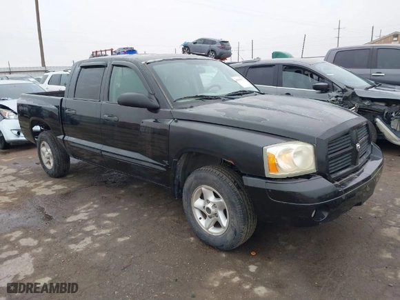 2006 Dodge Dakota SLT with VIN 1D7HE48N16S611010, listed as a IAAI auction lot 41018277 with 182,335 mi miles. Bid and sale history available at carsss.com. Image 1.