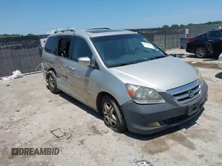 2005 Honda Odyssey EX-L with VIN 5FNRL38745B098184, listed as a IAAI auction lot 42503899 with 220,419 mi miles and . Bid and sale history available at DreamBid. Image 1.