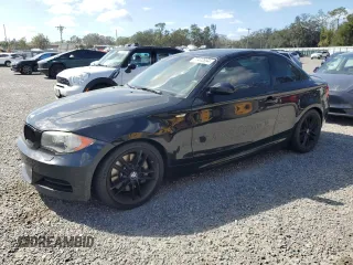 2008 BMW 1 Series 135i with VIN WBAUC73558VF24221, listed as a Copart auction lot 77442894 with 147,335 mi miles and Clean Title. Bid and sale history available at carsss.com. Image 1.