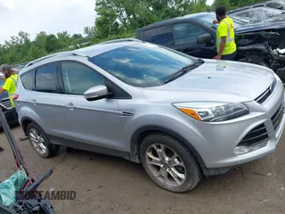 2016 Ford Escape Titanium with VIN 1FMCU9J95GUB93585, listed as a IAAI auction lot 42614106 with 124,465 mi miles and . Bid and sale history available at DreamBid. Image 13.