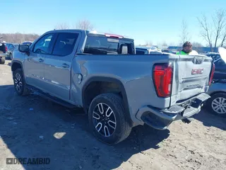2025 GMC Sierra 1500 AT4 with VIN 3GTUUEELXSG138620, listed as a IAAI auction lot 41805574 with 13,056 mi miles. Bid and sale history available at carsss.com. Image 3.