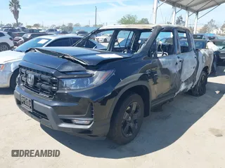 2024 Honda Ridgeline Black Edition with VIN 5FPYK3F89RB015601, listed as a IAAI auction lot 41880308 with Not provided miles and . Bid and sale history available at DreamBid. Image 2.
