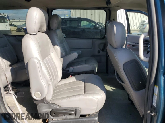 2003 Chevrolet Venture Y3G Mobility z VIN 1GNDX03E83D163083, wystawiony jako Copart lot #85219854 z przebiegiem 165 776 mil mil oraz Szkoda całkowita • Salvage title. Historia ofert i sprzedaży dostępna na DreamBid. Obrazek 11.