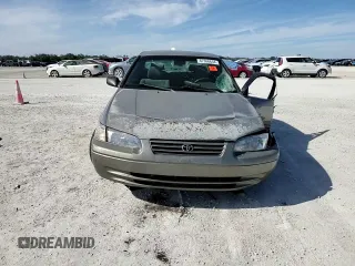 1999 Toyota Camry LE z VIN 4T1BG22K8XU426130, wystawiony jako Copart lot #87368604 z przebiegiem 276 204 mil mil oraz Szkoda całkowita • Salvage title. Historia ofert i sprzedaży dostępna na DreamBid. Obrazek 11.