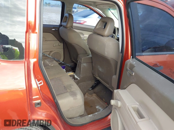 2008 Jeep Compass Sport with VIN 1J8FT47048D558171, listed as a IAAI auction lot 40563245 with 115,301 mi miles. Bid and sale history available at carsss.com. Image 8.