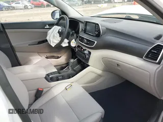 2019 Hyundai Tucson Value z VIN KM8J33A41KU013023, wystawiony jako IAAI lot #42302643 z przebiegiem 41 231 mil mil oraz . Historia ofert i sprzedaży dostępna na DreamBid. Obrazek 5.
