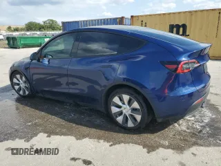 2022 Tesla Model Y Long Range with VIN 7SAYGAEE2NF390507, listed as a Copart auction lot 50986965 with 48,027 mi miles and Non Repairable. Bid and sale history available at DreamBid. Image 2.