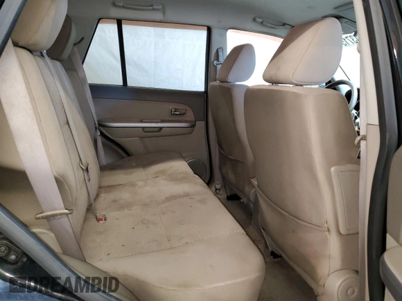 2011 Suzuki Grand Vitara Premium z VIN JS3TD0D24B4103142, wystawiony jako Copart lot #43715135 z przebiegiem 170 422 mil mil oraz Szkoda całkowita • Salvage title. Historia ofert i sprzedaży dostępna na DreamBid. Obrazek 11.