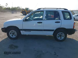 2001 Chevrolet Tracker z VIN 2CNBE13C916939402, wystawiony jako IAAI lot #42232082 z przebiegiem 103 693 mil mil oraz . Historia ofert i sprzedaży dostępna na DreamBid. Obrazek 15.