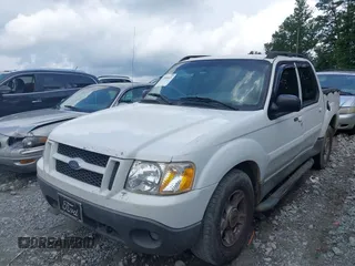 2004 Ford Explorer Sport Trac XLS z VIN 1FMZU67K44UA57074, wystawiony jako IAAI lot #42505321 z przebiegiem 282 904 mil mil oraz . Historia ofert i sprzedaży dostępna na DreamBid. Obrazek 2.