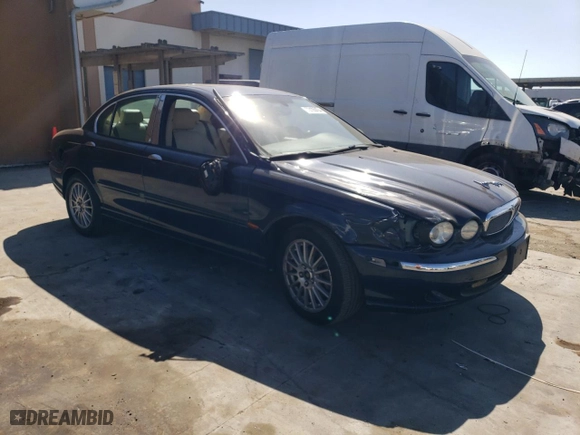 2008 Jaguar X-Type with VIN SAJWA51A38WJ36788, listed as a Copart auction lot 73103604 with 192,416 mi miles and Salvage Title. Bid and sale history available at carsss.com. Image 4.