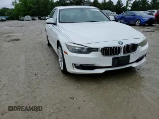 2013 BMW 3 Series 328i with VIN WBA3A5G52DNP18972, listed as a Copart auction lot 58122935 with 209,173 mi miles and Salvage title. Bid and sale history available at DreamBid. Image 14.