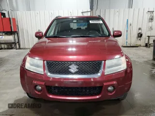 2006 Suzuki Grand Vitara Premium z VIN JS3TD943X64100331, wystawiony jako Copart lot #49650655 z przebiegiem 166 276 mil mil oraz Szkoda całkowita • Salvage title. Historia ofert i sprzedaży dostępna na DreamBid. Obrazek 5.