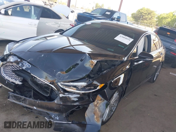 2020 Ford Fusion Titanium with VIN 3FA6P0RU8LR141324, listed as a IAAI auction lot 42004026 with 107,136 mi miles and . Bid and sale history available at DreamBid. Image 17.