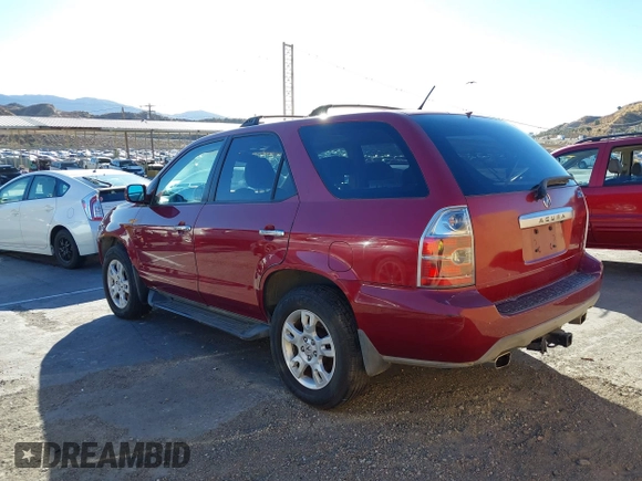 2004 Acura MDX Touring Pkg w/Navigation with VIN 2HNYD18874H519565, listed as a IAAI auction lot 41383264 with 140,095 mi miles. Bid and sale history available at carsss.com. Image 3.