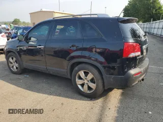 2013 Kia Sorento EX with VIN 5XYKU4A60DG394087, listed as a Copart auction lot 60324665 with 130,736 mi miles and Salvage title. Bid and sale history available at DreamBid. Image 2.