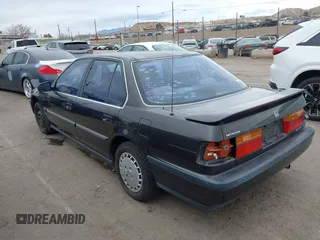 1991 Honda Accord LX with VIN JHMCB7653MC090847, listed as a IAAI auction lot 41561641 with 163,258 mi miles. Bid and sale history available at carsss.com. Image 3.
