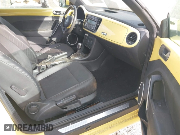 2013 Volkswagen Beetle 2.5L with VIN 3VW5P7AT1DM802091, listed as a IAAI auction lot 41947850 with 92,937 mi miles and . Bid and sale history available at DreamBid. Image 5.