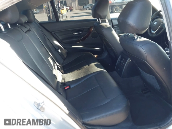 2015 BMW 3 Series 328i with VIN WBA3A5C57FF609054, listed as a IAAI auction lot 41330498 with 129,378 mi miles. Bid and sale history available at carsss.com. Image 8.