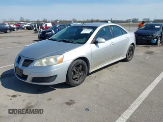 2009 Pontiac G6 1SB z VIN 1G2ZJ57B094263057, wystawiony jako IAAI lot #42092436 z przebiegiem 170 212 mil mil oraz . Historia ofert i sprzedaży dostępna na DreamBid. Obrazek 2.