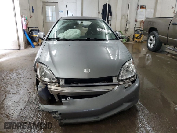 2000 Honda Insight with VIN JHMZE1376YT000164, listed as a Copart auction lot 53851695 with 72,940 mi miles and Salvage title. Bid and sale history available at DreamBid. Image 5.