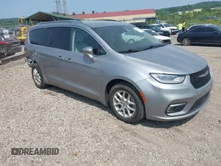 2021 Chrysler Pacifica Touring L with VIN 2C4RC1BG4MR528098, listed as a IAAI auction lot 42405757 with 54,930 mi miles and . Bid and sale history available at DreamBid. Image 1.