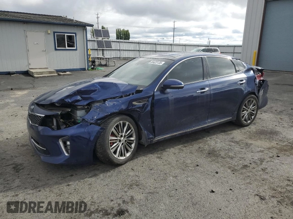 2018 Kia Optima SX with VIN 5XXGV4L25JG230508, listed as a Copart auction lot 56423135 with 100,575 mi miles and Salvage title. Bid and sale history available at DreamBid. Image 1.