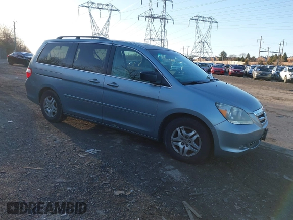 2007 Honda Odyssey EX-L z VIN 5FNRL387X7B081408, wystawiony jako IAAI lot #41143045 z przebiegiem 201 248 mil mil oraz . Historia ofert i sprzedaży dostępna na DreamBid. Obrazek 1.