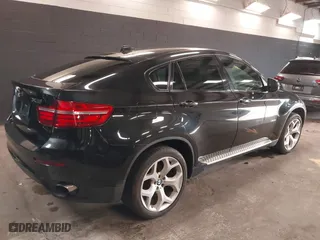 2014 BMW X6 xDrive35i with VIN 5UXFG2C51E0K41841, listed as a IAAI auction lot 41851513 with 79,272 mi miles. Bid and sale history available at carsss.com. Image 4.