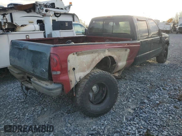 2003 Ford F-350 XL with VIN 1FTWW33F63EA29777, listed as a Copart auction lot 81047684 with 214,722 mi miles and Salvage Title. Bid and sale history available at DreamBid. Image 3.