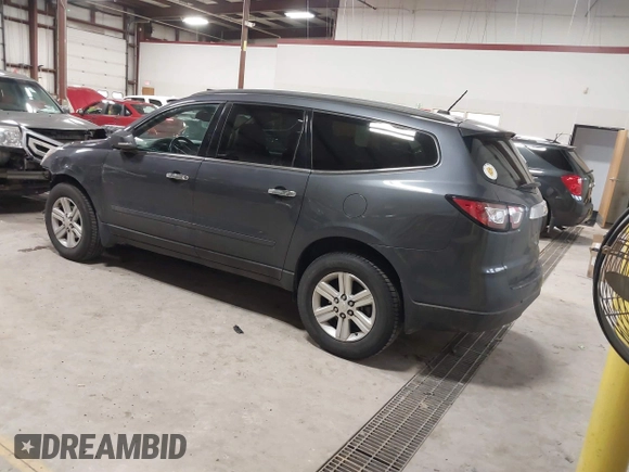 2013 Chevrolet Traverse LT with VIN 1GNKVJKD9DJ152592, listed as a IAAI auction lot 41143281 with 199,259 mi miles and . Bid and sale history available at DreamBid. Image 3.