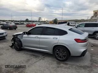 2021 BMW X4 M40i with VIN 5UX2V5C07M9G03839, listed as a Copart auction lot 79852123 with 0 mi miles. Bid and sale history available at carsss.com. Image 2.