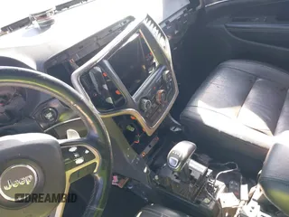 2014 Jeep Grand Cherokee Limited with VIN 1C4RJEBT5EC228056, listed as a IAAI auction lot 41454896 with Not Provided miles and . Bid and sale history available at DreamBid. Image 18.