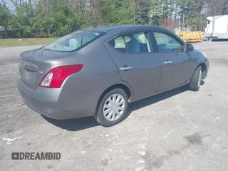 2012 Nissan Versa SV with VIN 3N1CN7AP8CL889109, listed as a IAAI auction lot 42018726 with 123,077 mi miles. Bid and sale history available at carsss.com. Image 4.
