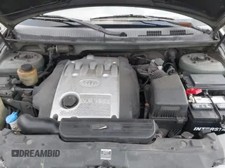 2004 Kia Sedona LX with VIN KNDUP131346533373, listed as a IAAI auction lot 41632342 with 76,545 mi miles. Bid and sale history available at carsss.com. Image 10.