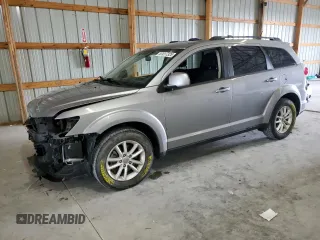 2017 Dodge Journey SXT with VIN 3C4PDCBB9HT612828, listed as a Copart auction lot 57017325 with 117,648 mi miles and Salvage title. Bid and sale history available at DreamBid. Image 1.