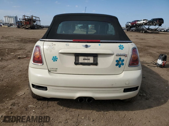 2010 MINI Convertible S with VIN WMWMS3C51ATZ85166, listed as a Copart auction lot 52907775 with 90,090 mi miles and Salvage title. Bid and sale history available at DreamBid. Image 6.