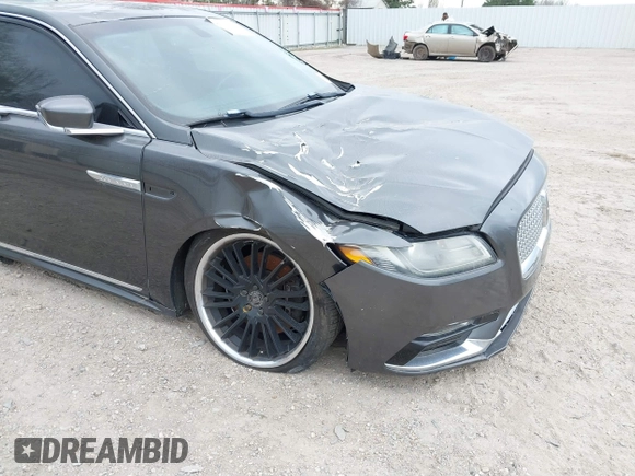 2018 Lincoln Continental Premiere z VIN 1LN6L9PK3J5603389, wystawiony jako IAAI lot #41691647 z przebiegiem 72 139 mil mil oraz . Historia ofert i sprzedaży dostępna na DreamBid. Obrazek 6.