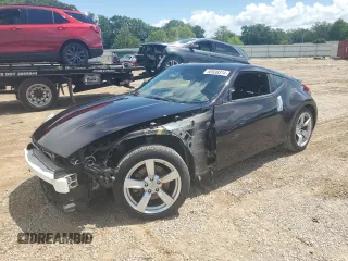 2012 Nissan 370Z Touring with VIN JN1AZ4EH9CM561796, listed as a Copart auction lot 60938314 with 59,011 mi miles and Salvage Title. Bid and sale history available at carsss.com. Image 1.