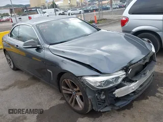 2015 BMW 4 Series 428i with VIN WBA3V7C54FP772531, listed as a IAAI auction lot 41487899 with 90,893 mi miles. Bid and sale history available at carsss.com. Image 1.