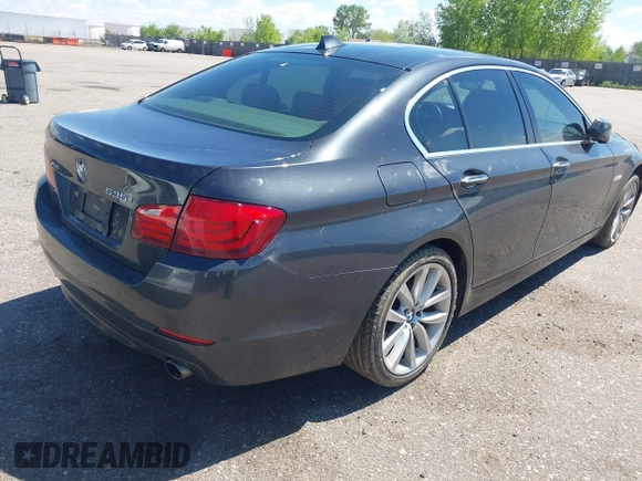 2013 BMW 5 Series 535i xDrive with VIN WBAFU7C51DDU71407, listed as a IAAI auction lot 42233098 with 211,608 mi miles and . Bid and sale history available at DreamBid. Image 4.