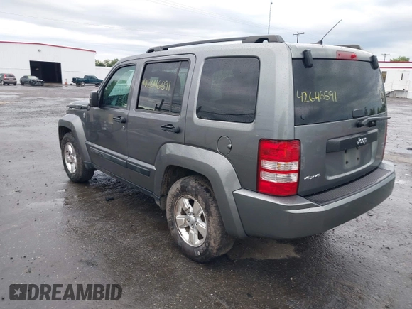 2012 Jeep Liberty Sport with VIN 1C4PJMAK2CW118636, listed as a IAAI auction lot 42646591 with 170,607 mi miles and . Bid and sale history available at DreamBid. Image 3.