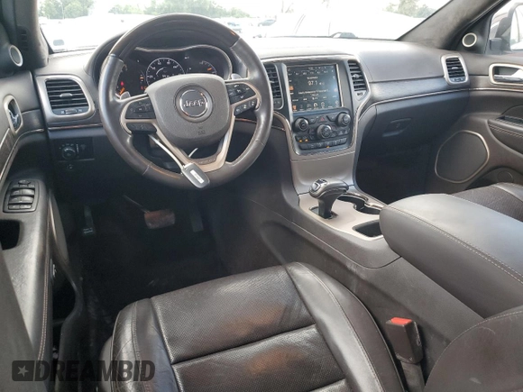 2014 Jeep Grand Cherokee Summit с VIN 1C4RJEJG4EC380074, выставлен на аукционе Copart как лот 64123175 с пробегом 237 803 миль миль и Списание • Salvage title. История ставок и продаж доступна на DreamBid. Изображение 8.