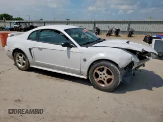 2004 Ford Mustang Standard with VIN 1FAFP40664F183429, listed as a Copart auction lot 60099525 with 162,981 mi miles and Salvage title. Bid and sale history available at DreamBid. Image 4.