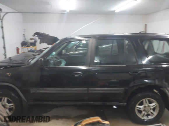 2000 Honda CR-V EX with VIN JHLRD1865YS007202, listed as a IAAI auction lot 41801108 with 134,387 mi miles. Bid and sale history available at carsss.com. Image 14.