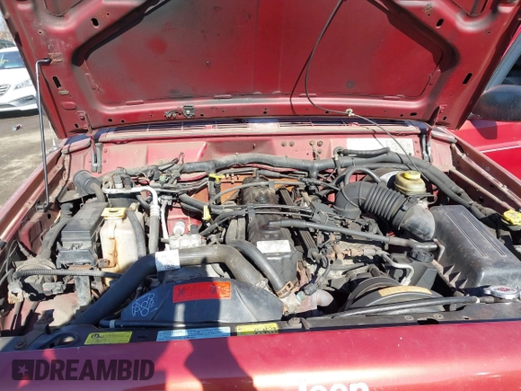 1999 Jeep Cherokee Sport with VIN 1J4FF68S4XL552718, listed as a IAAI auction lot 41443871 with 310,874 mi miles and . Bid and sale history available at DreamBid. Image 10.