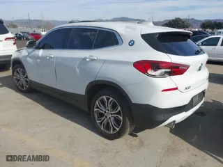 2020 BMW X2 sDrive28i with VIN WBXYH9C01L5P15004, listed as a IAAI auction lot 41128060 with 86,052 mi miles. Bid and sale history available at carsss.com. Image 3.