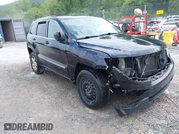 2011 Jeep Grand Cherokee Laredo with VIN 1J4RR4GG8BC543468, listed as a IAAI auction lot 42431481 with 224,639 mi miles and . Bid and sale history available at DreamBid. Image 1.