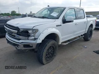 2019 Ford F-150 XL with VIN 1FTEW1E51KKC41183, listed as a IAAI auction lot 42049732 with 113,451 mi miles and . Bid and sale history available at DreamBid. Image 2.