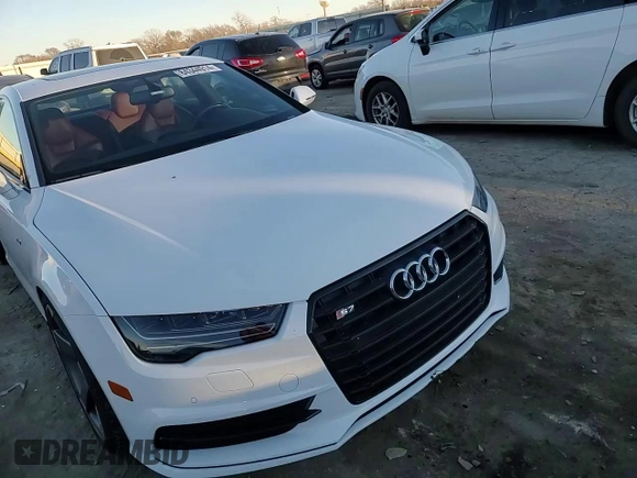 2017 Audi S7 Premium Plus z VIN WAUWFAFC5HN055118, wystawiony jako Copart lot #84344914 z przebiegiem 60 750 mil mil oraz Szkody całkowita. Historia ofert i sprzedaży dostępna na DreamBid. Obrazek 11.